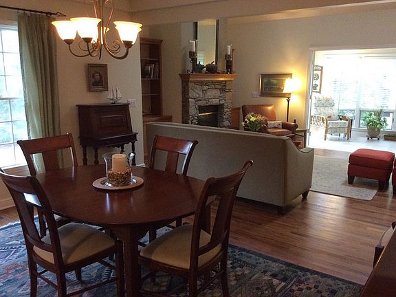 Dining room
						:
						View from kitchen looking into LR & glassed in porch with ceramic tile floor