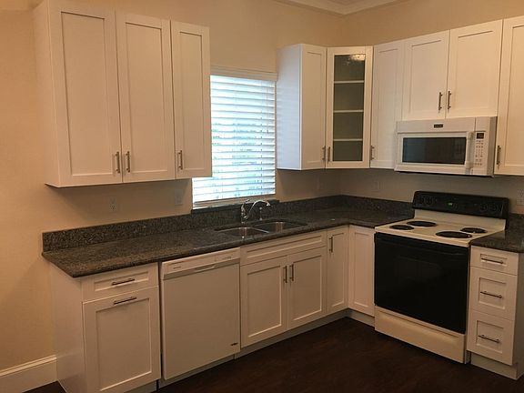 KITCHEN WITH DISHWASHER AND TRASH BIN - BUILT-IN MICROWAVE