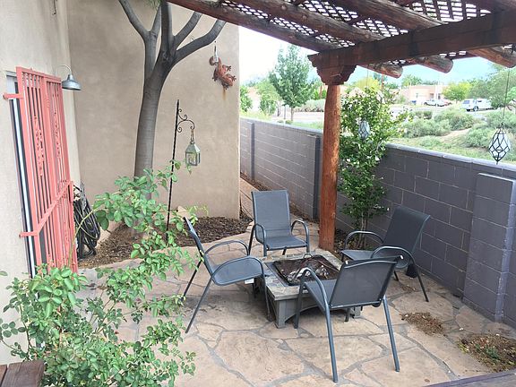 Patio with open space behind.