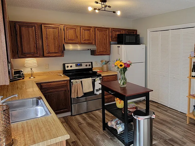 kitchen; laundry behind accordion doors