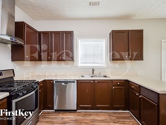 4th image of 3309 SE Coach House Ct