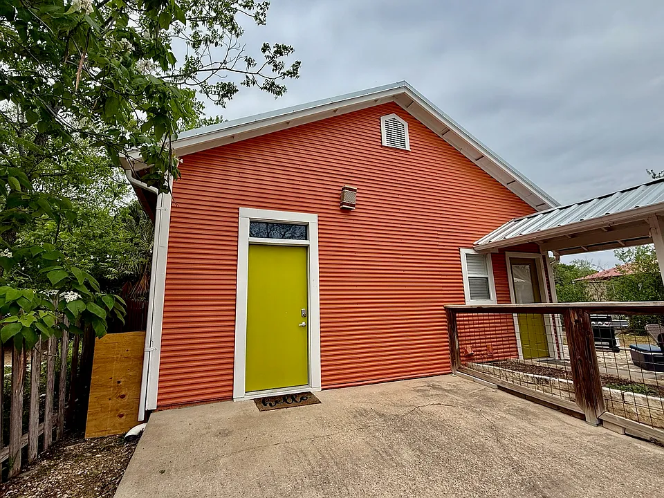Front entry with a motion sensor light by the door and a keyless entry