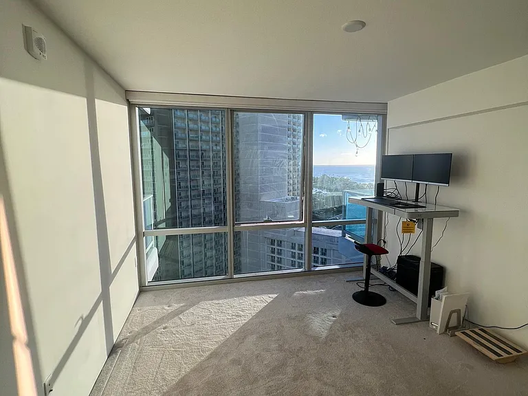 Bedroom with walk-in closet