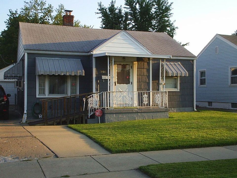 front of home drive way with additional pad