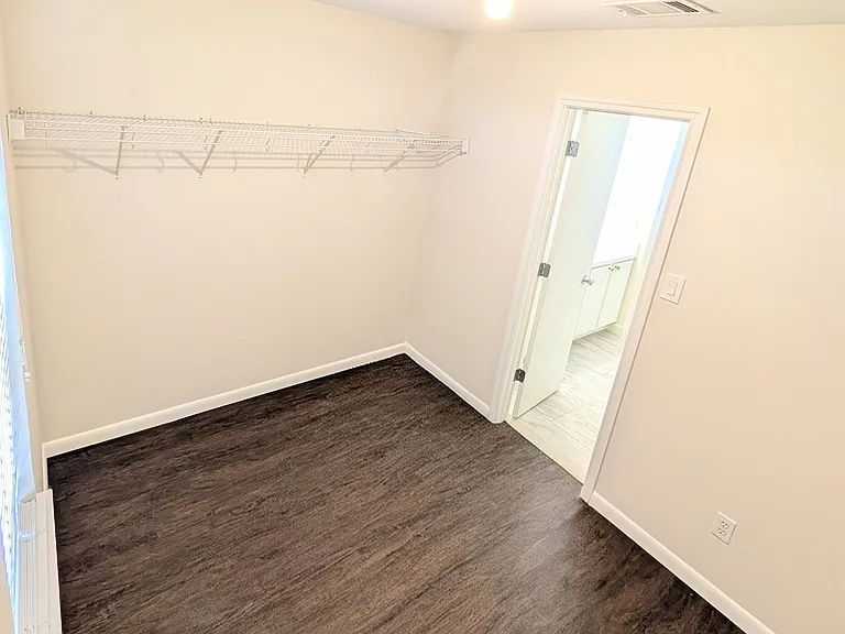 Master Bedroom Closet facing South/Street view