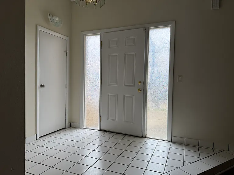 main entry, front door, foyer. great natural light!
