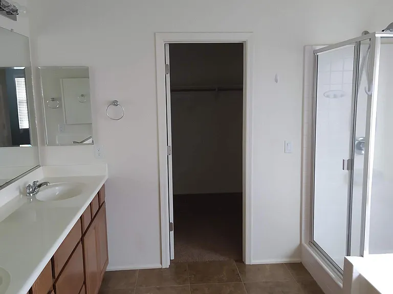 Master bathroom with walk in closet