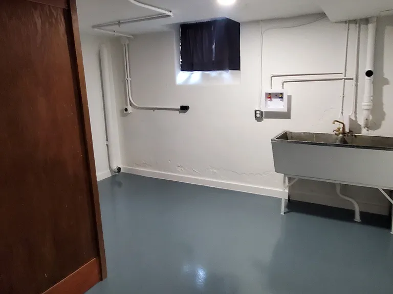 Huge Laundry Room w/ Utility Sink and Storage Cabinet