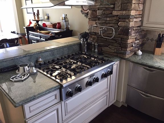 High end appliances and fireplace