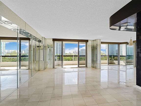 5th image of 3600 Mystic Pointe Dr APT 812