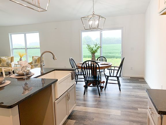 Farmhouse Sink in Island and Dining Area Example