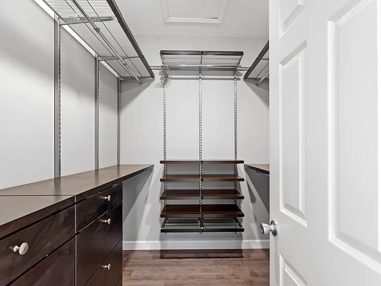 Master closet with Elfa brand closet system