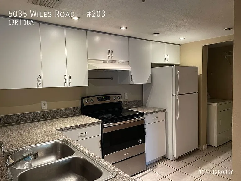 5035 Wiles Rd #203 — Photo 1