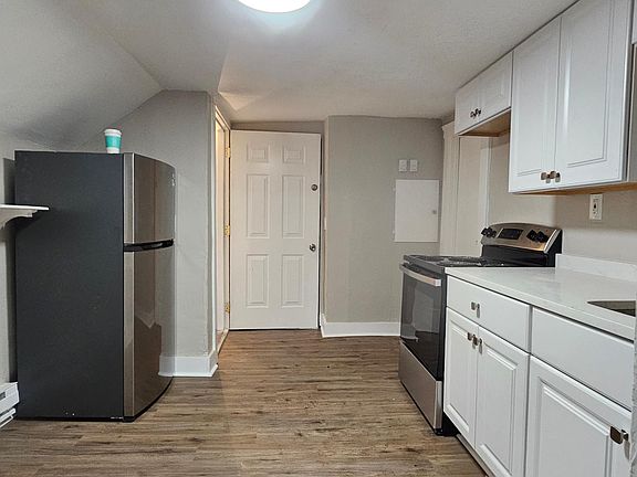 View of the kitchen from the dining area.