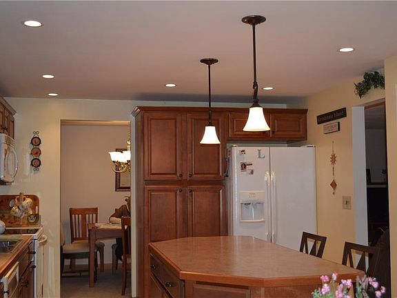 Kitchen island comfortably seats 3