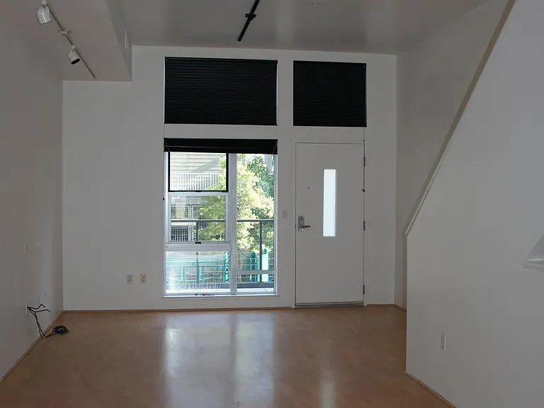 Living room looking towards front door and patio