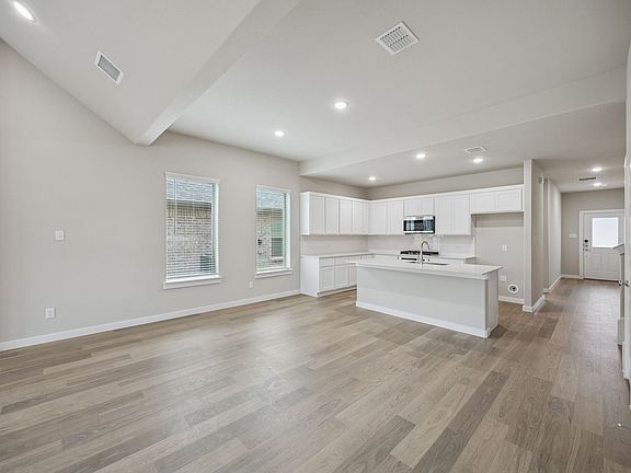 Open First Floor in the Stanley II home plan by Trophy Signature Homes - REPRESENTATIVE PHOTO