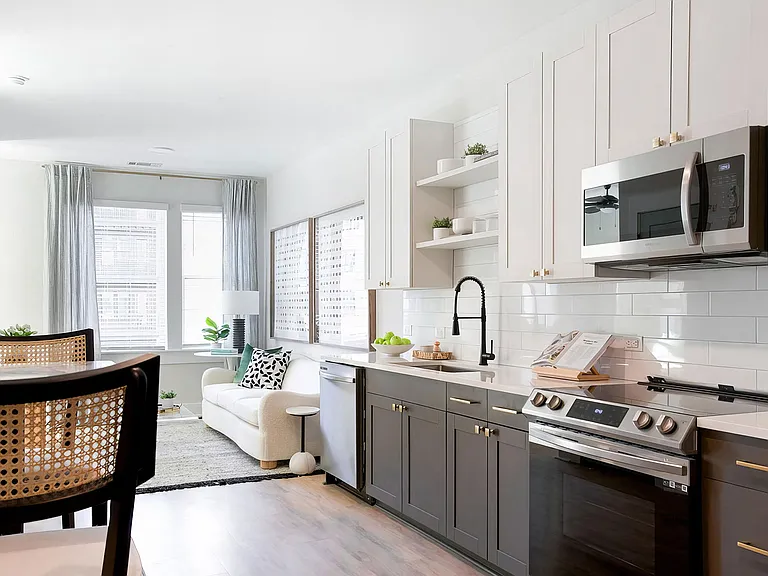 Luxurious open floor concept with social dining and living area