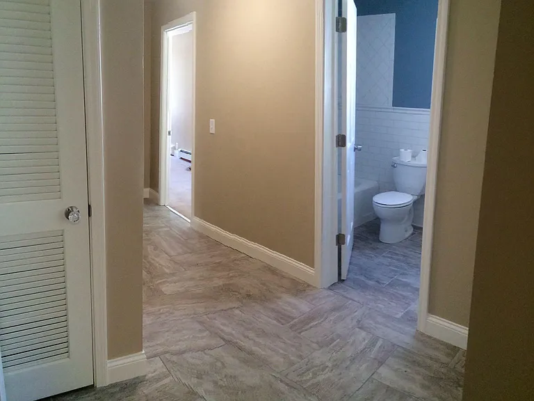 hallway to bath, laundry and both bedrooms