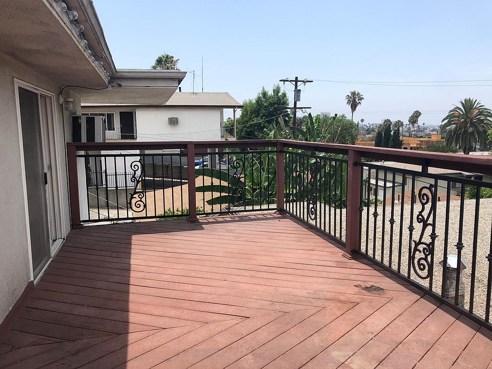 The sliding door from the living room leads to the deck.