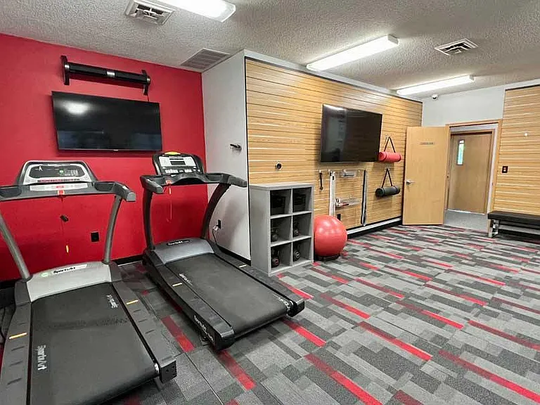 Our 24/7 fitness center is fully equipped to meet all your workout needs.