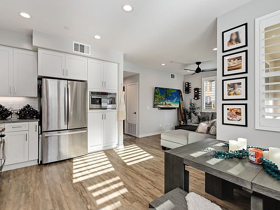 Main living area, kitchen, and dining area