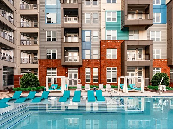 Swimming Pool with Sun Shelf and Cabanas
