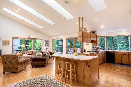 Captivating design with 30' high ceilings and a tremendous open airy feel. Incredible light-filled s