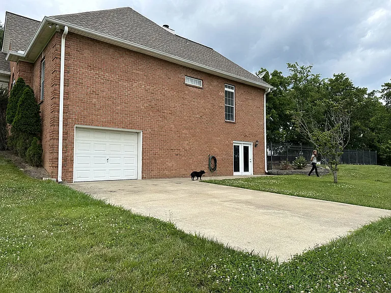 sideyard with parking pad