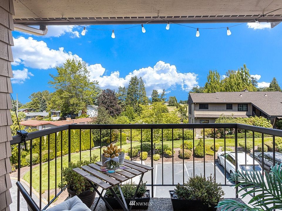 Relax on your private balcony while catching glimpses of the golf course.