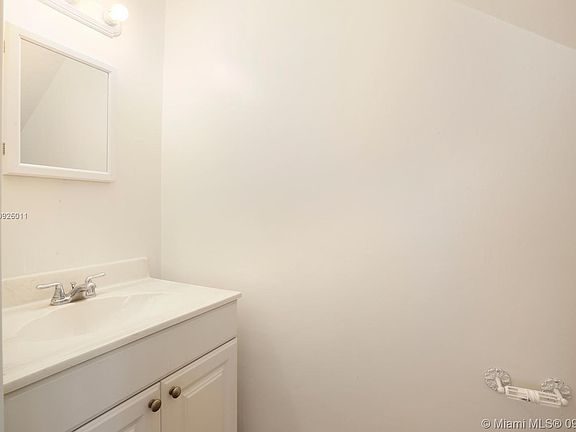 This is the powder room located downstairs.