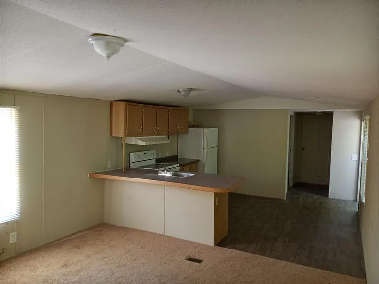 Living room... kitchen area