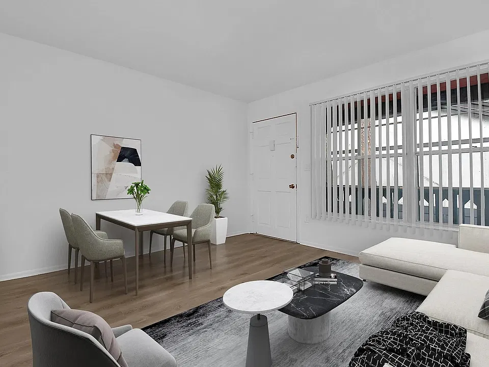 Step into modern sophistication with this spacious living area, perfect for relaxation and entertaining, featuring sleek design elements and an inviting ambiance that feels like home.