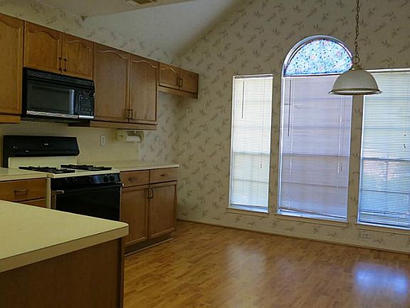 View of the cozy kitchen.
