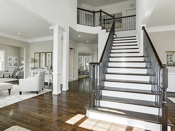Grand foyer entry with hardwood floors