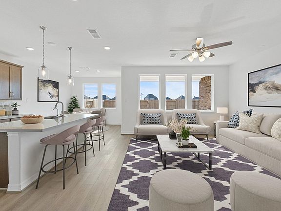 Open concept living space. Note Sample product photo - actual exterior and interior selections may