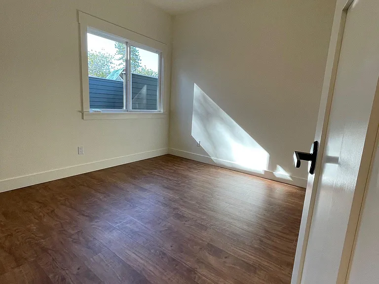 bedroom 1, with ceiling fan