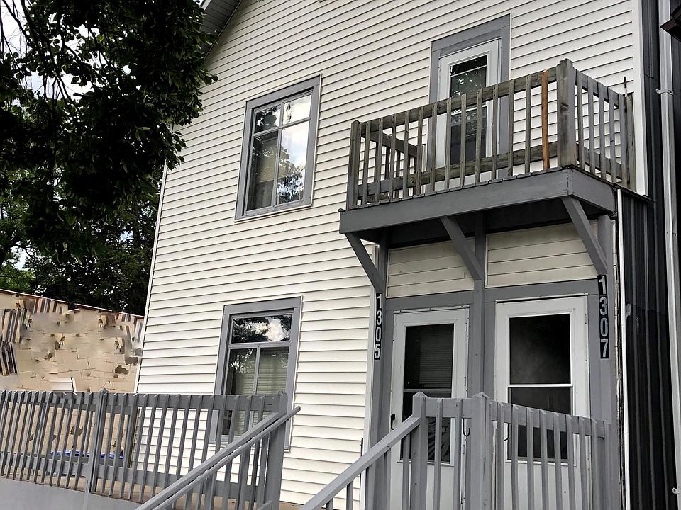 Lower unit triplex features dedicated front deck space. Fenced backyard and with secure storage.