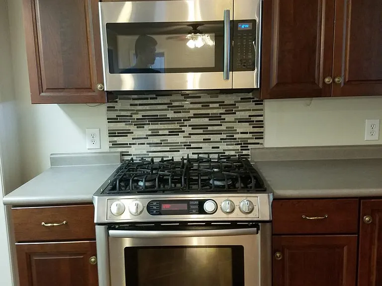 Bosch gas stovetop/oven with Samsung microwave