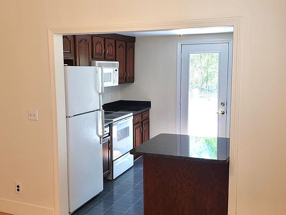 This is Showing the eat at counter and part of the large Dinning room or Both .... Depending on Need of Family.