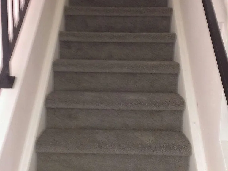 Stairs going up to second floor. Bedroom on right. Bathroom just at stairs. Master bedroom far left.