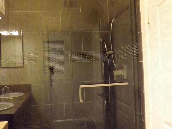 Master bedroom renovated shower and bathroom with his and he