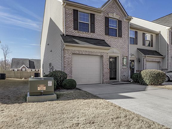 Features a one car garage and a driveway that fits 2 cars