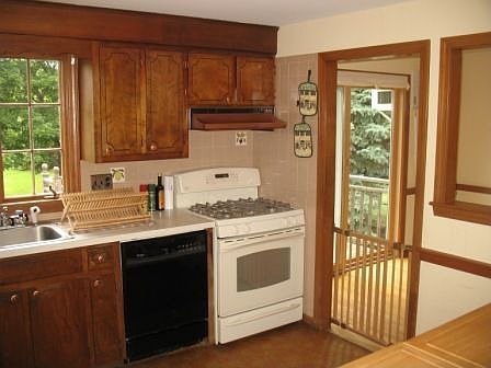 Kitchen - newer stove & fridge, both top of the line GE Profile