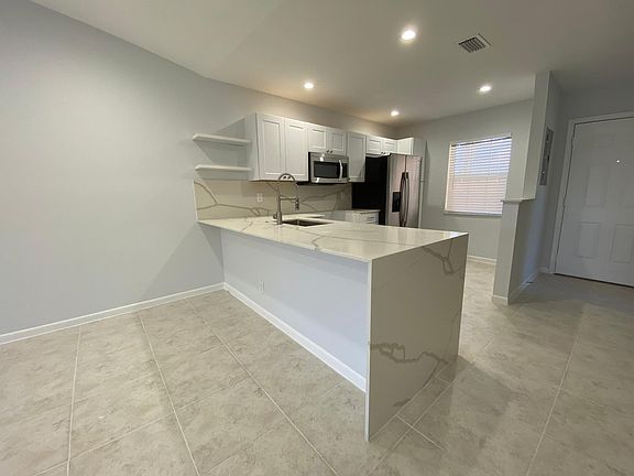 4th image of 9973 Three Lakes Cir