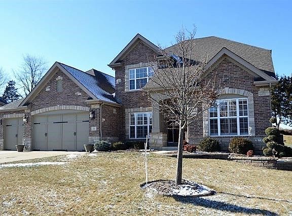 Three car finished oversized garage and driveway including seperate workshop area