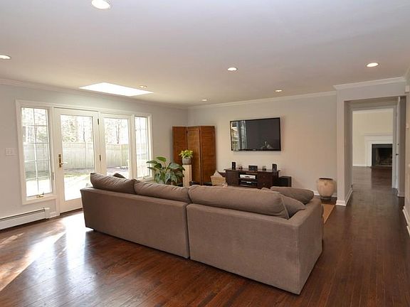 Spacious Family Room with French doors to new
        terr
