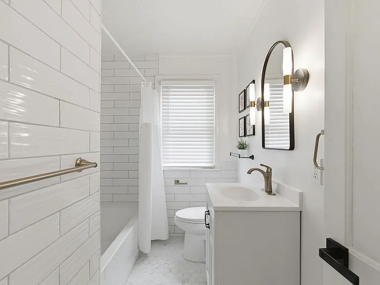 The fully renovated bath has a spa feel.