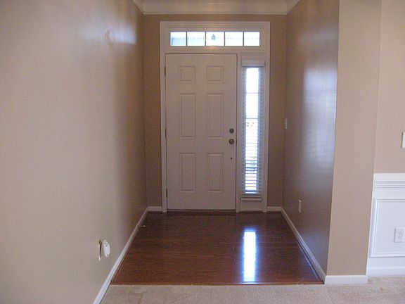 Gracious Foyer with hardwood floor