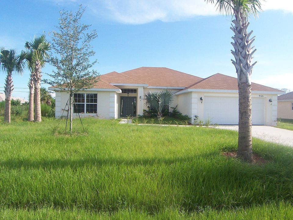 Front Yard with Palm Trees
